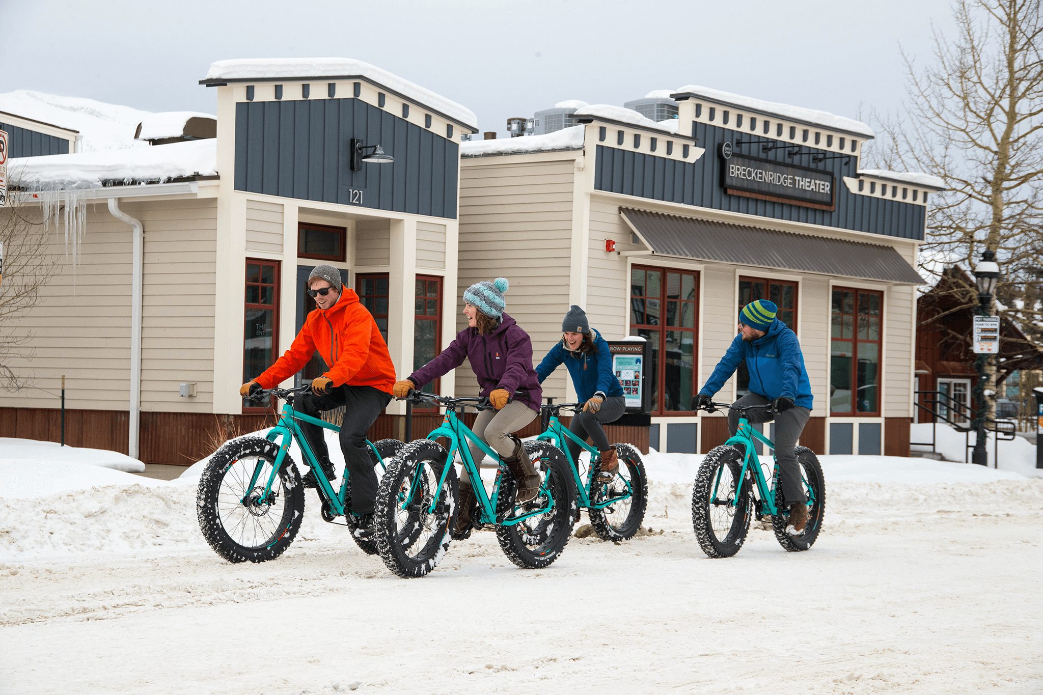 A group of friends fat biking in Breckenridge.