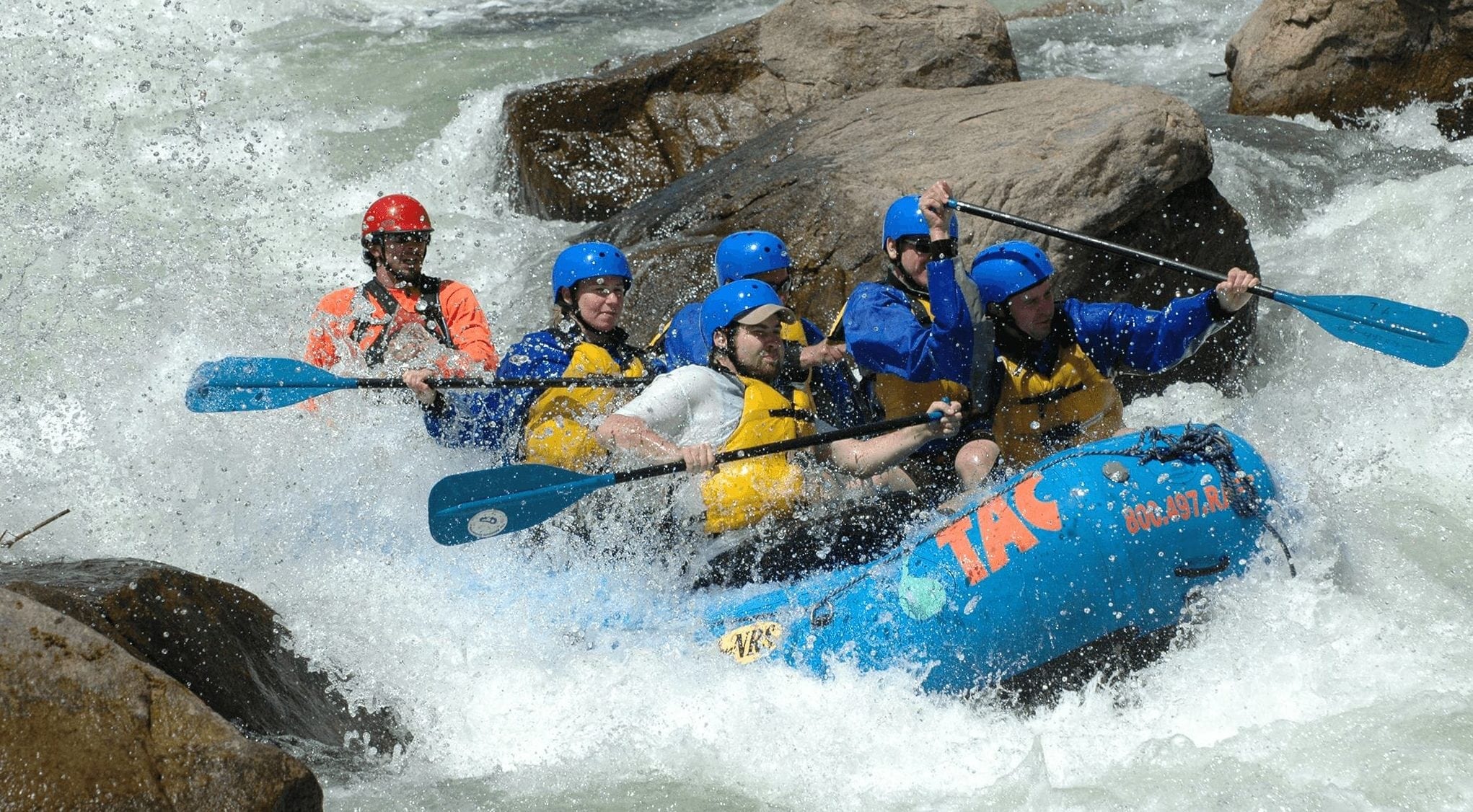 A group white water rafting on the Blue River in Breckenridge