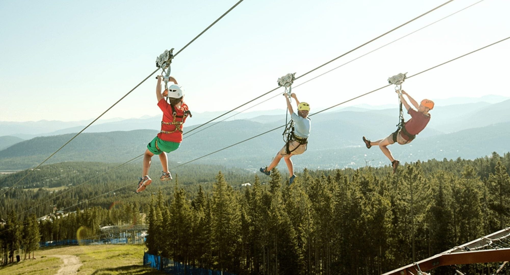 Group Ziplining during the summer at Epic Discovery in Breckenridge