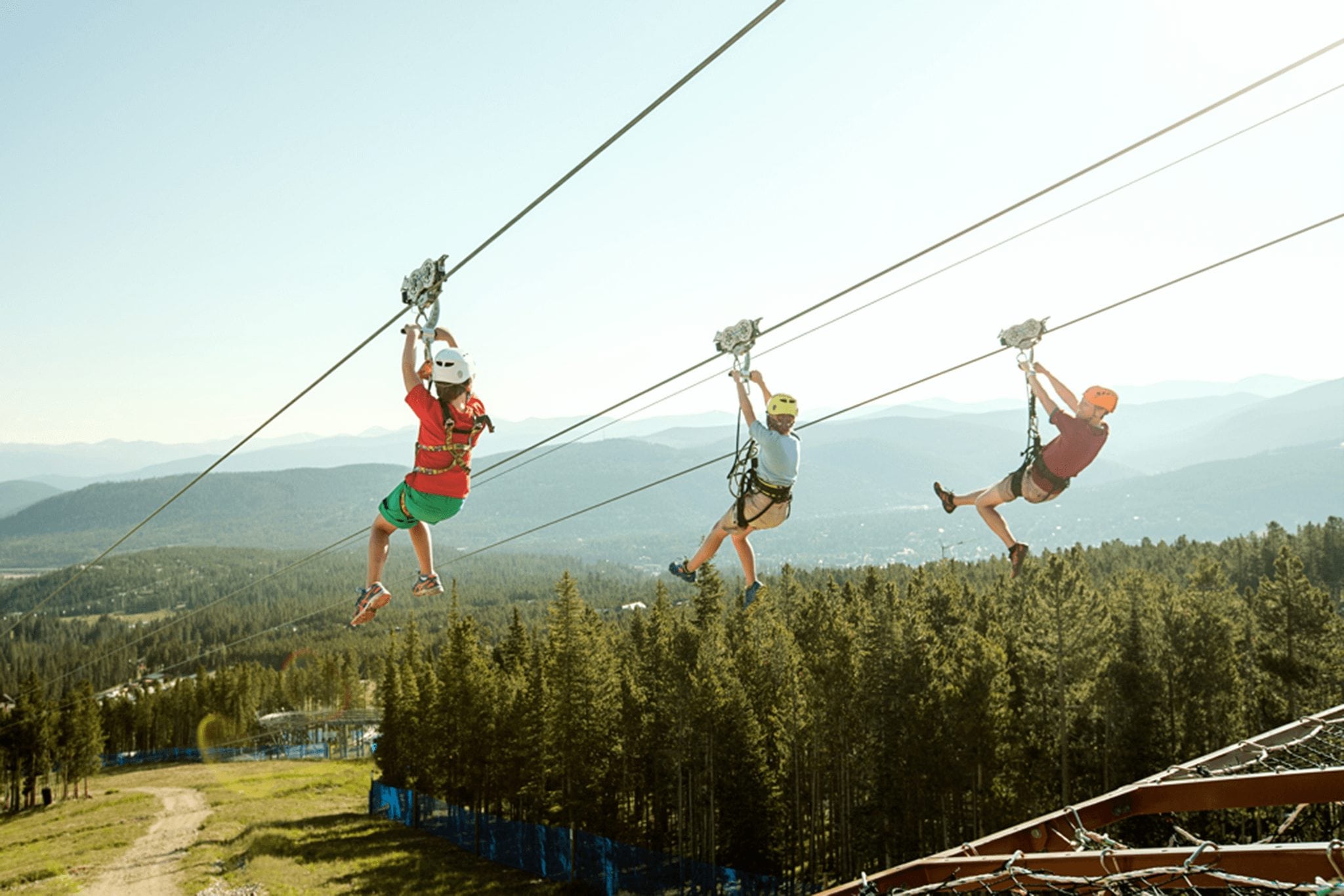 Group Zip Lining during the summer at Epic Discovery in Breckenridge