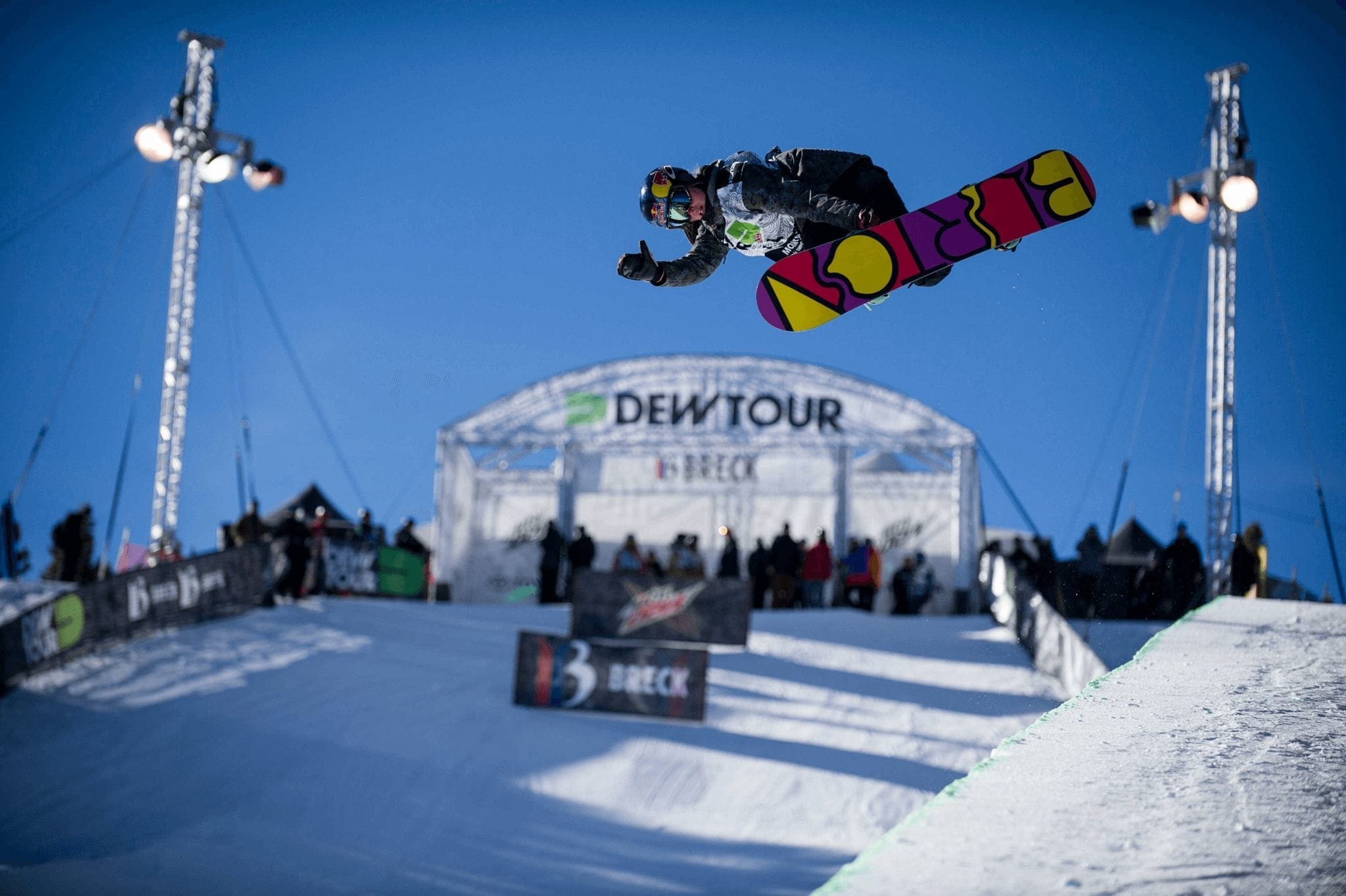Snowboarder Catching Air on Breckenridge Dew Tour's Super Pipe